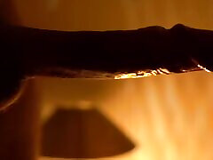 Amateur babe sucking and jerking cock by candlelight