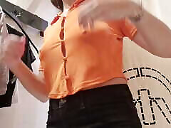 the curtain in the fitting room is open, I flash my tits