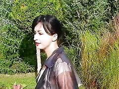Garden, beautiful sunny day. Wanilianna in photo fat tits raincoat, black seamed nylons