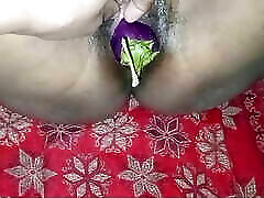 Tamil bhabhi&039;s pussy was tight by penetrating the brinjal and breaking the seal of the pussy, then fucked with a thick cock