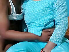 Romancing a new girl in a green suit.