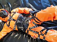 OnlyFans teaser - Heavyrubber latex lady enjoys rainwear and harness!