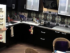 Naked teen cooking
