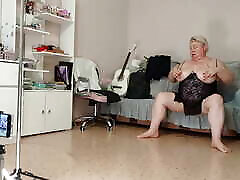 Mother-in-law fingering her tits and pussy with her hands