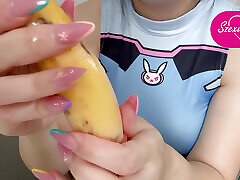 My stepsister puts a condom on the banana, plays with it, then sticks it in a nud ladies pussy
