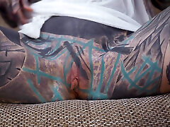 Anuskatzz grabs her cold, stainless steel toy and slides it deep into her tight ass