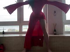 yoga in tight transparent red dress