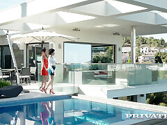Sybil and Stacy Bloom play with each other out by the pool before threesome