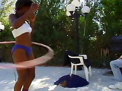 Super hot mulatto babe takes her swimwear off