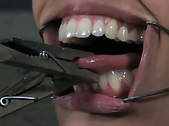 Skanky Latin doxy gets her nose holes and mouth widened with BDSM gadgets