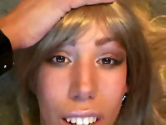 Holding the camera and masturbating