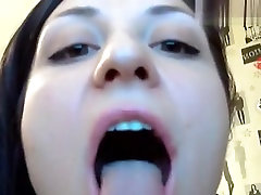 Illana sucks dildo
