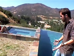 Nicole Ray looks so sexy outside in the pool