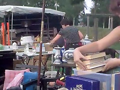 A common amateur downblouse caught in the street