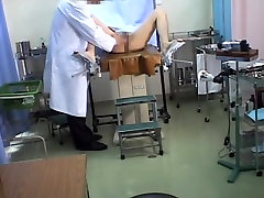 Busty Japanese has some fun during her kinky pussy exam