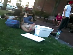 old handy-vid of a topless hippie-girl in a crowd