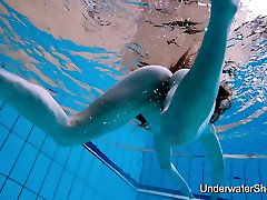 Sexy girl shows magnificent young body underwater
