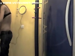 Two brunette gals caught in tanning room