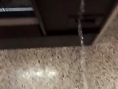 Peeing in a vending machine