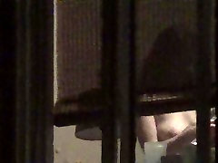 Neighbors tits through apartment window