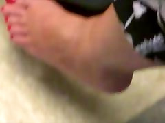 Gina teasing with her sexy feet.