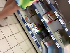 Woman in colorful short skirt upskirt