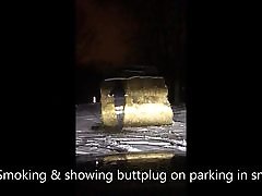 Smoking & showing tearing bra sucking boobs in snow at parking