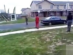 Black maids throwing punches in the street