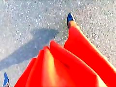 POV Walking in a flared orange skirt and heels