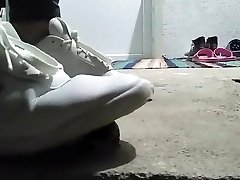 Snail crushed under sneakers
