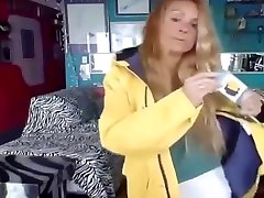 woman shows off her new yellow preson women and long wellies