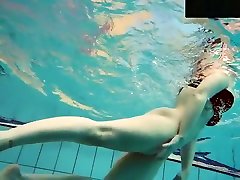 Tattooed Baby Swirls Underwater