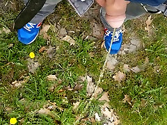 pising outside street with my new balance