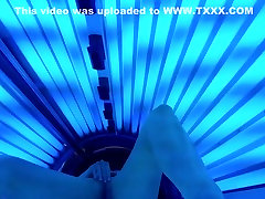Hot wife masturbates in public tanning bed