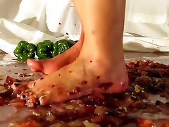 Crushing grapes, crackers, and peppers barefoot
