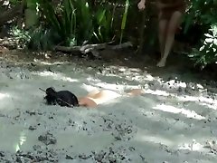 Stripped and pushed into mud