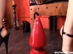 Kelly Wells fills her ass with huge dildos