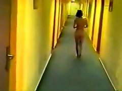 Girl strips naked and wander hotel halls