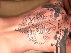 Tattooed ginger cums after bareback analsex