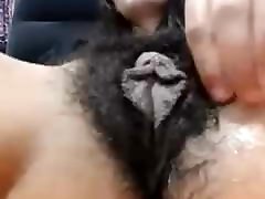 Mature very hairy cunt with long labia