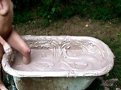 MILF in stand up insemination tub masturbates and has orgasm
