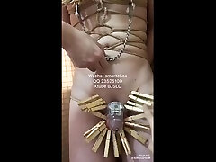 a slave weared cb and pins to do bdsm