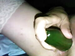 Sharing his wife a great cucumber