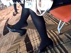 Mature air hostess dangling