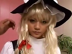 Amateur Girl in a Cosplay by Marisa Kirisame en Touhou Project