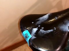 sliding ass over a slick mtb saddle then covering with cum