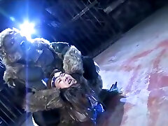 FEMALE WARRIOR IS BEING BEARHUGED