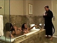 Three hot chicks in a bathtub are joined by one dick