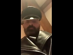 geared up in leathers and smoking before heading out