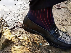 my black old loafers in the mud